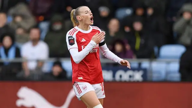 Chloe Kelly of Arsenal celebrates scoring her team's second goal