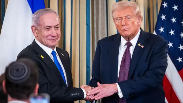 Netanyahu shaking Trump's hand