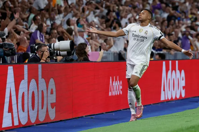 Kylian Mbappe reacts to missing a goal opportunity