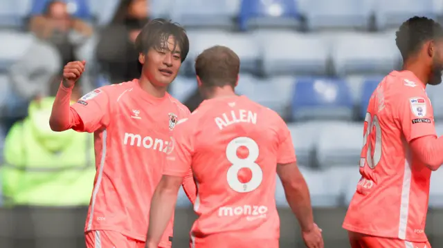 Tatsuhiro Sakamoto of Coventry City celebrates a goal.