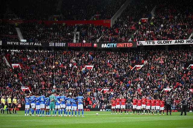 United and Sunderland lining up for a minutes silence