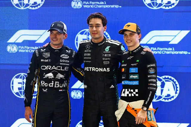 Max Verstappen, George Russell and Oscar Piastri pose for a photograph