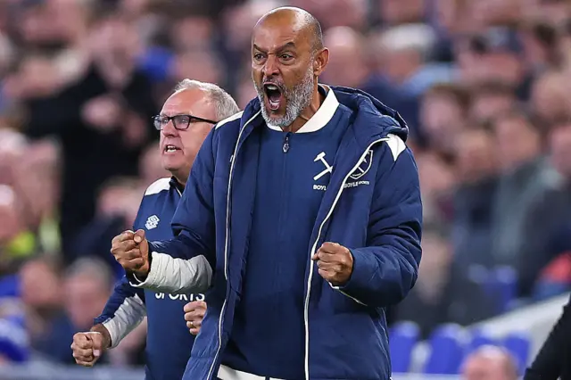 Nuno shouting and punching the air on the sideline