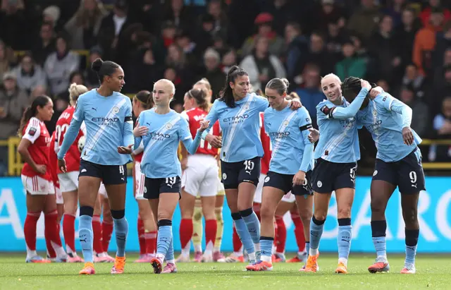 Khadija Shaw of Manchester City celebrates with teammates after scoring her team's first goal during the Barclays Women's Super League match between Manchester City and Arsenal at Joie Stadium on October 04, 2025 in Manchester, England.