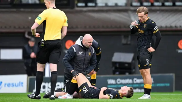 Lewis Smith goes down injured