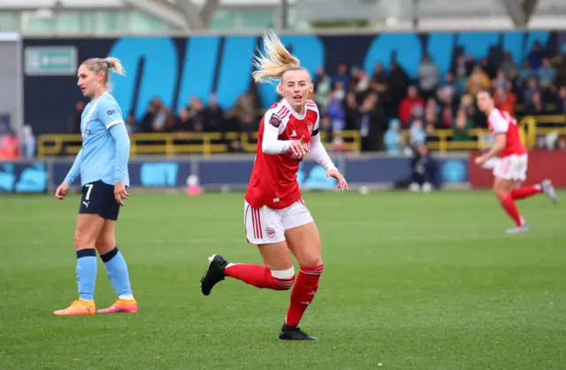 Arsenal's Chloe Kelly celebrates scoring their second goa