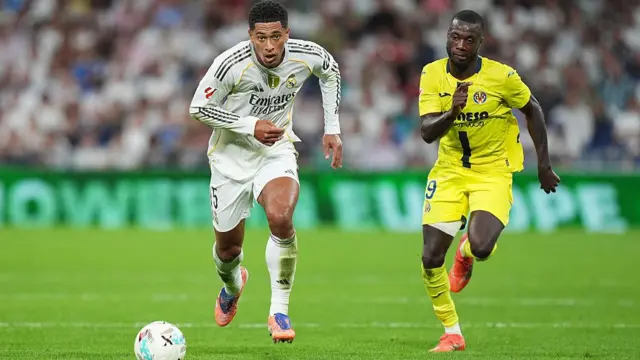 Jude Bellingham of Real Madrid runs for the ball