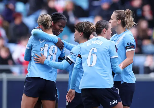 Manchester City's Khadija Shaw celebrates scoring their first goal with teammates