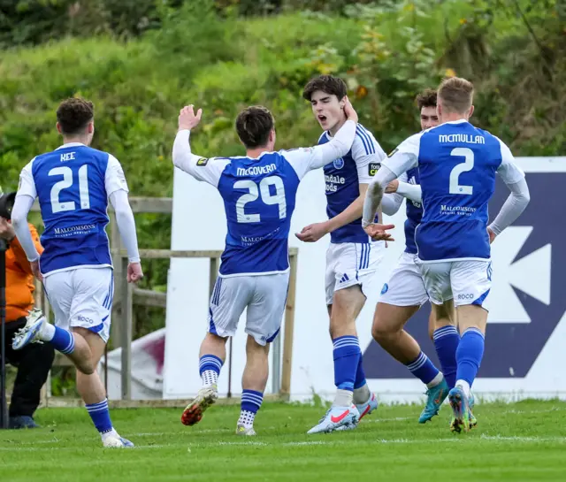 Luke McGerrigan celebrates scoring