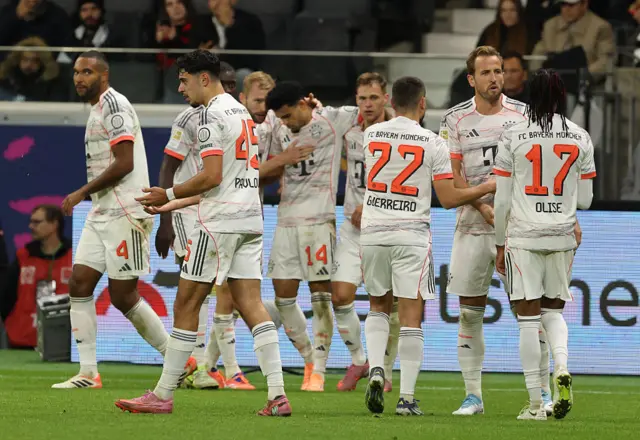 Luis Diaz celebrates with teammates scoring his team's third goal
