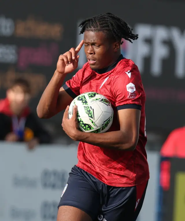 Zane Okoro celebrating scoring