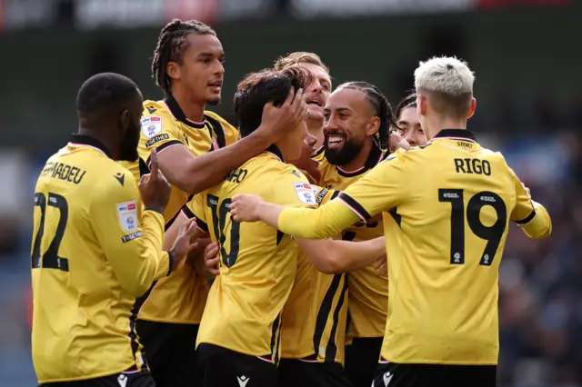 Million Manhoef of Stoke City celebrates with teammates after scoring