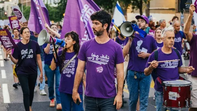 A photo of Alon-Lee Green at an Israeli peace protest.
