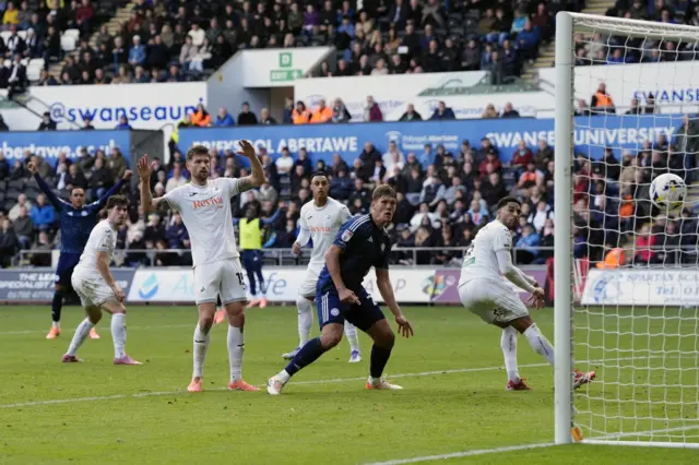 Leicester City's Jannik Vestergaard (second from right) scores