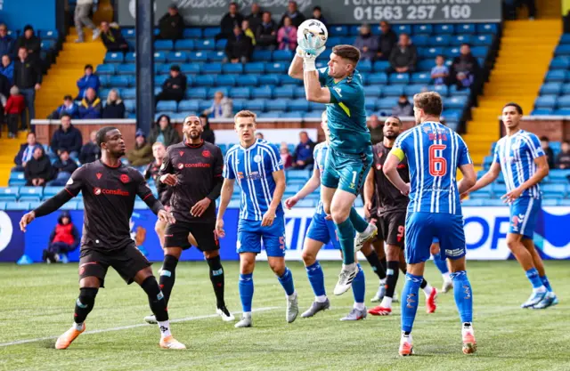 Kilmarnock's Max Stryjek comes to gather a cross