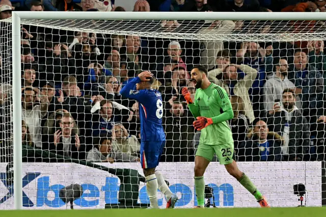 Enzo Fernandez in space quite close to goal but his header hits the outside of the post.