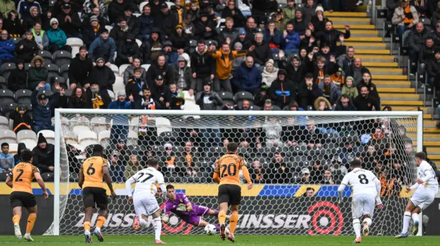 Harrison Burrows of Sheffield United sees his penalty kick saved by Ivor Pandur goalkeeper for Hull City