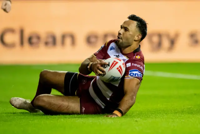 Bevan French sliding over for a Wigan try against Wigan