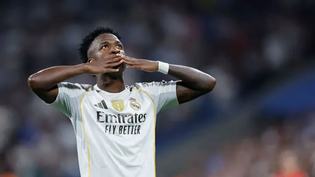 Vinicius Junior celebrates scoring the opening goal