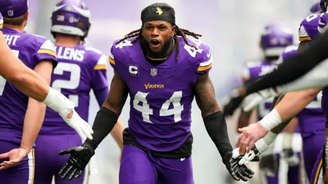 Josh Metellus of the Minnesota Vikings runs on to the field