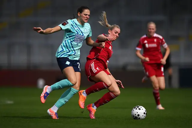 Isobel Goodwin of London City Lionesses and Gemma Bonner of Liverpool battle for possession during the Barclays Women's Super League match between London City Lionesses and Liverpool at Copperjax Community Stadium on October 05, 2025 in Bromley, England.