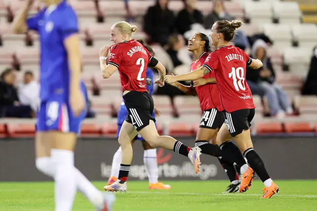 Sandbery celebrates her equaliser v Chelsea