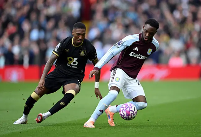 Lamare Bogarde of Aston Villa controls with the ball