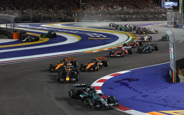 George Russell leads the field at the strat of the Singapore Grand Prix