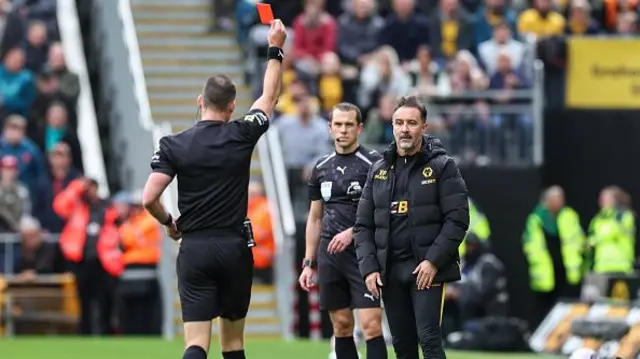 Wolverhampton Wanderers manager Vitor Pereira is shown a red card by Referee Jarred Gillett