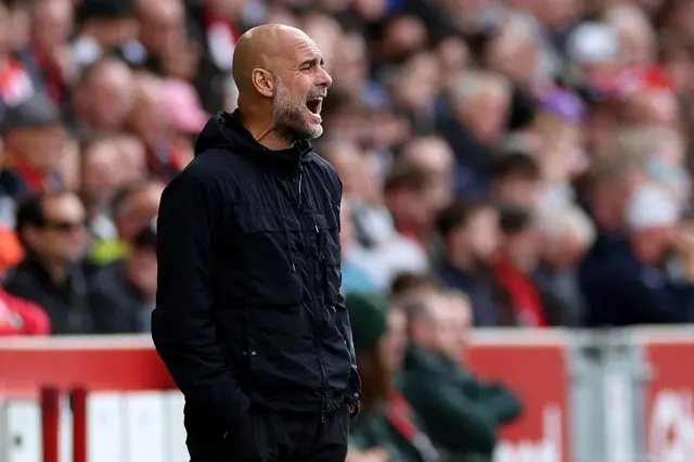 Pep Guardiola shouts