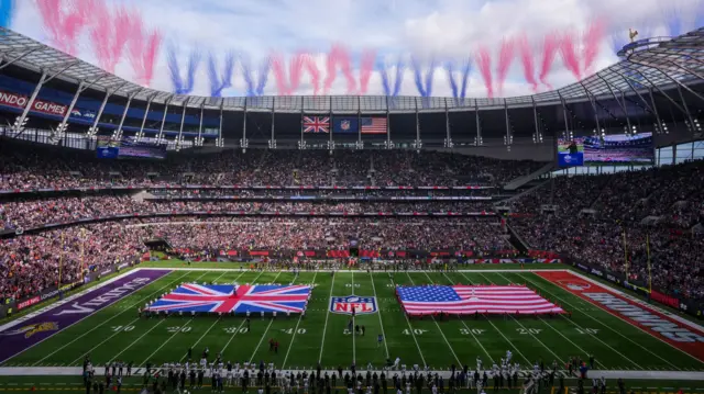 Flags on the field before the Minnesota Vikings play the Cleveland Browns at Tottenham