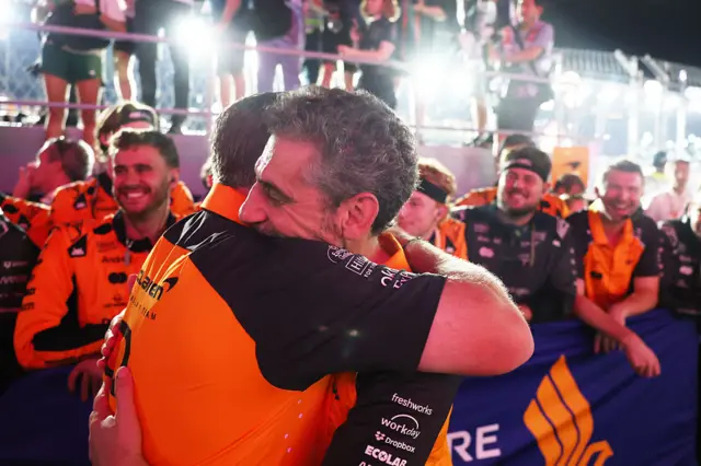 Zak Brown, Chief Executive Officer of McLaren and Andrea Stella, Team Principal of McLaren celebrate