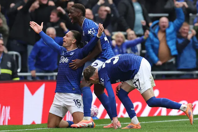 Jack Grealish (L) celebrates with teammates