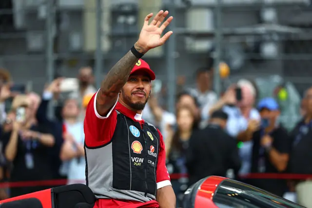 Lewis Hamilton waves to the crowd in Singapore