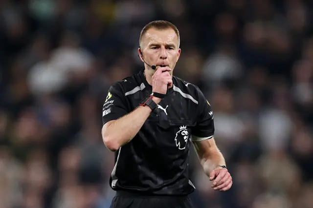 Match referee Michael Salisbury reacts