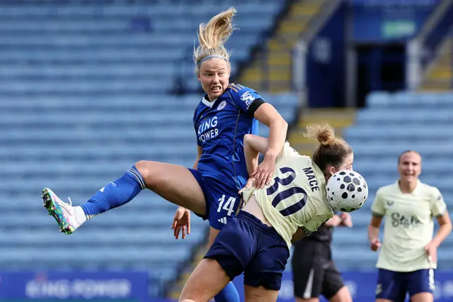 Mace and Rantala battle for the ball