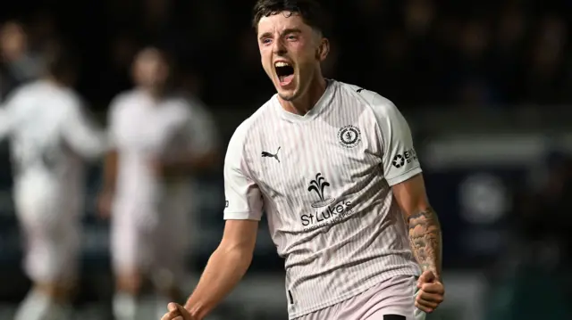 Reece Hutchinson celebrates scoring