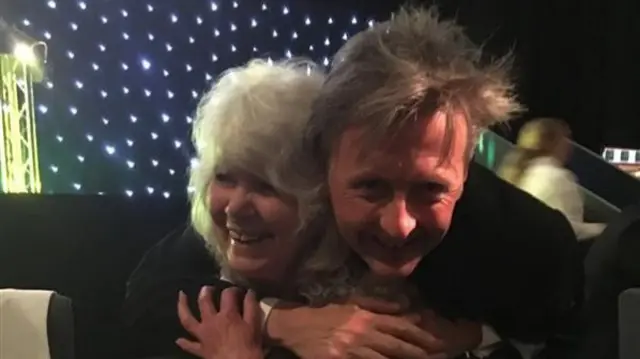 Mark Cummings hugs Jilly Cooper