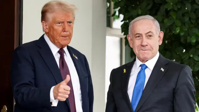 U.S. President Donald Trump gives a thumbs up as he welcomes Israeli Prime Minister Benjamin Netanyahu at the White House
