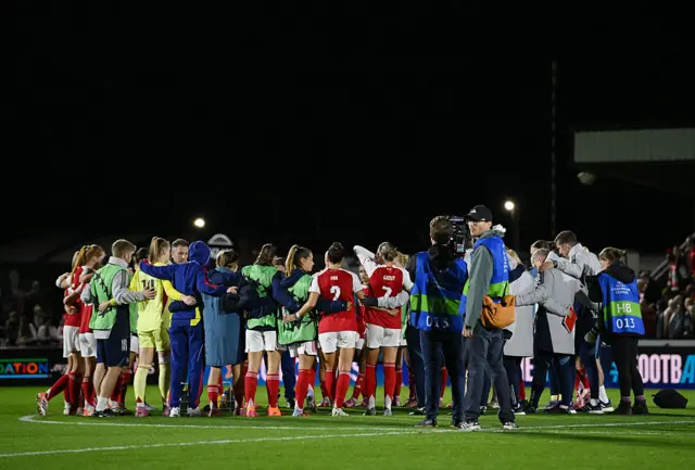 Players of Arsenal form a huddle