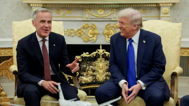 Trump and Canada laugh as they sit together
