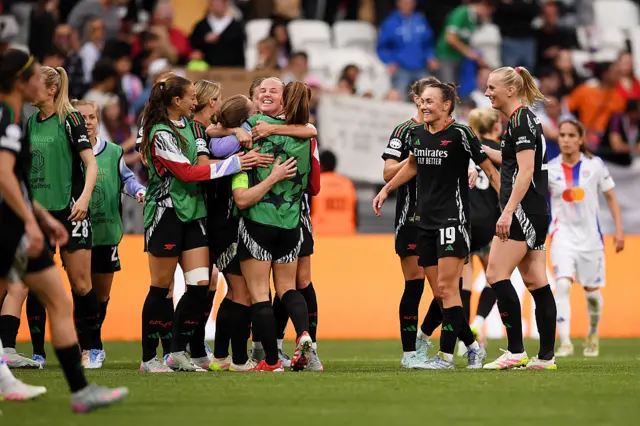 Beth Mead and team mates of Arsenal celebrate victory following the UEFA Women's Champions League semifinal second leg match between Olympique Lyonnais and Arsenal WFC at OL Stadium on April 27, 2025 in Decines-Charpieu, France.