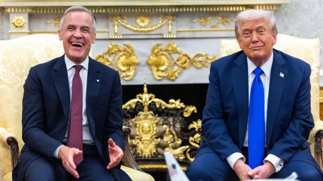 Mark Carney laughing in the Oval Office as he sits next to President Trump