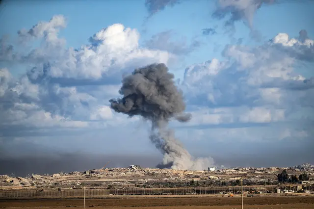Smoke rises after Israeli airstrikes targeted residential areas in the Gaza Strip, as seen from Israel near the border, on October 07, 2025