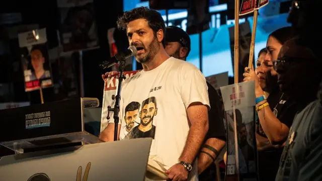 Liran Berman speaks at a rally