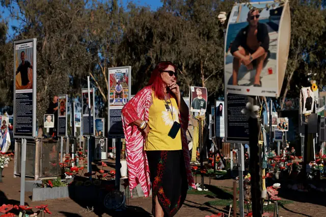 Nova festival family members and survivors gather at the site of the deadly attack