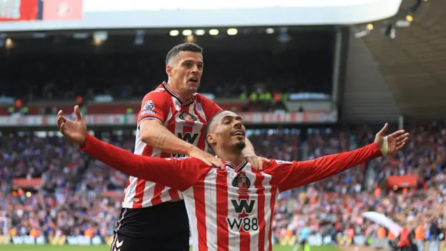 Wilson Isidor celebrates with teammate Granit Xhaka