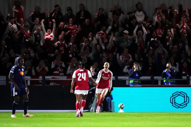 Arsenal's Alessia Russo (right) celebrates scoring their side's first goal of the game during the UEFA Women's Champions League match at Meadow Park, Borehamwood.