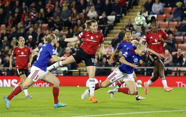 Manchester United's Elisabeth Terland heads at goal.