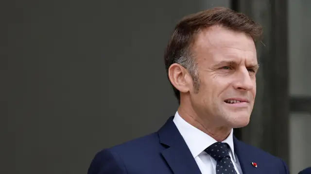 French President Emmanuel Macron reacts as he waits for the arrival of a guest at the Elysee Palace in Paris, France, October 8, 2025